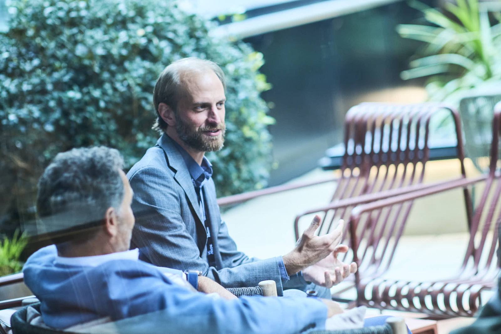 Lars Johnson in conversation between sessions at FTT Payments Europe